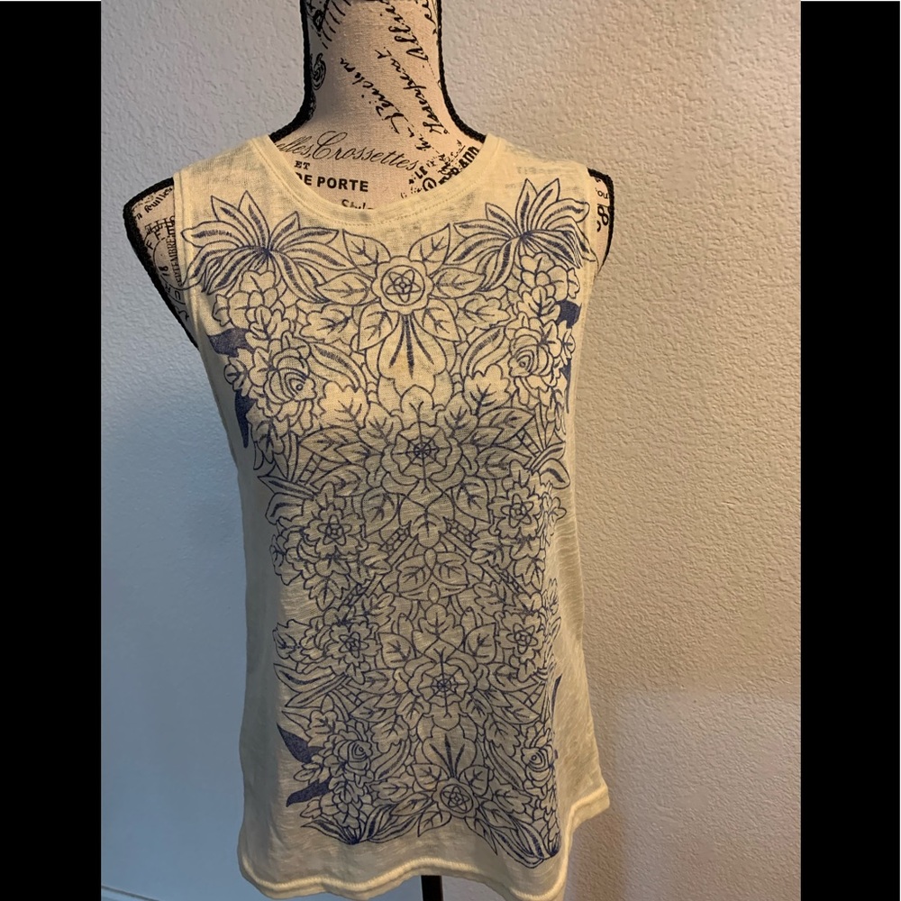 Woman’s Yellow Tank Top With Blue Floral Patterns
